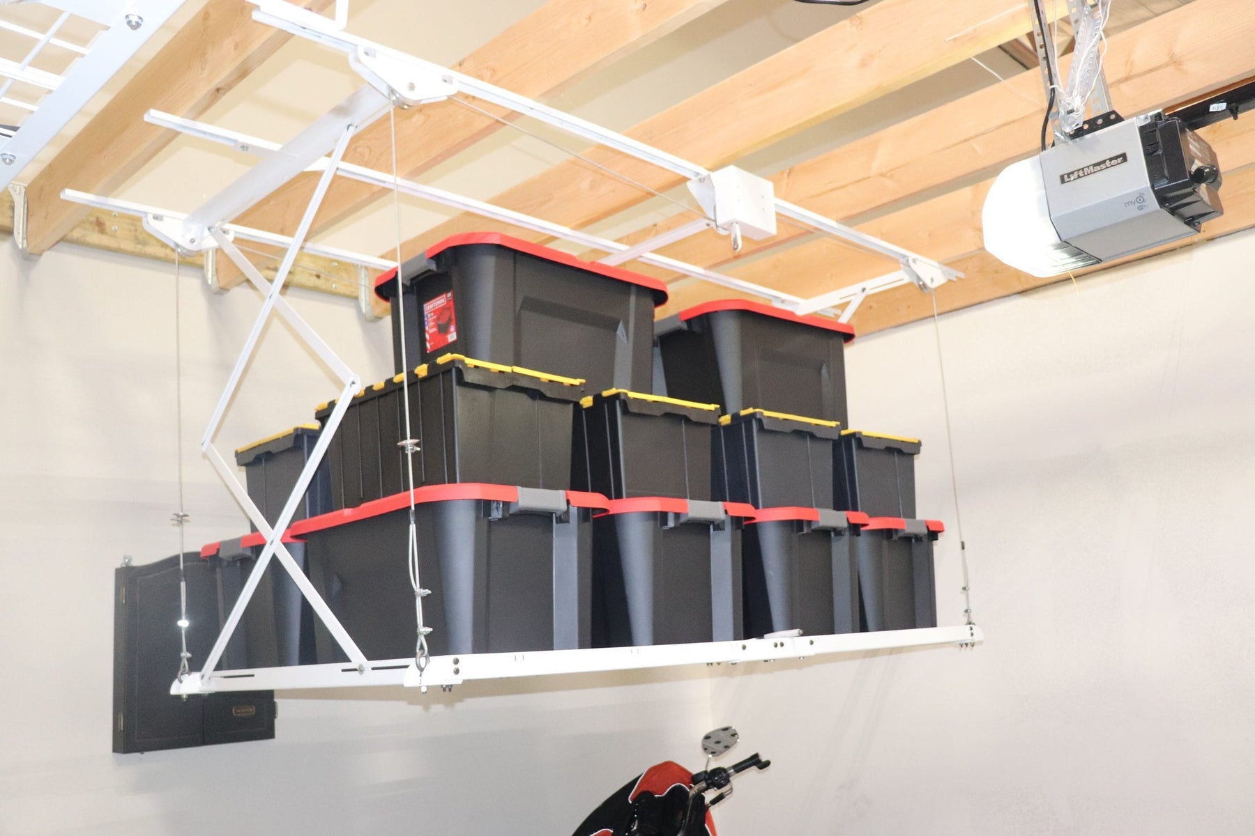 Syzzor Loft – Retractable Garage Storage Lift – Garage Door Nation